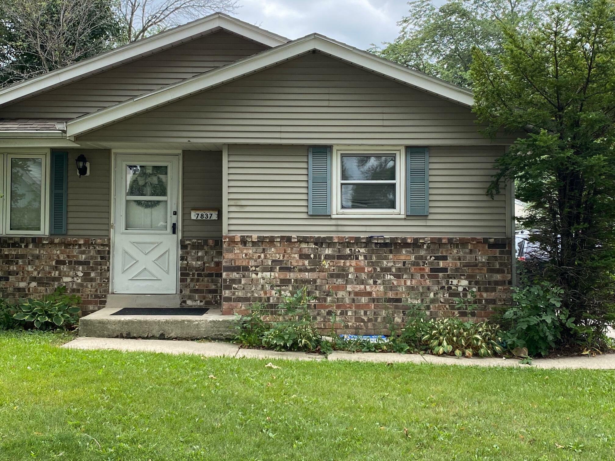 Property Photo:  7837 W Beechwood Ave  WI 53223 