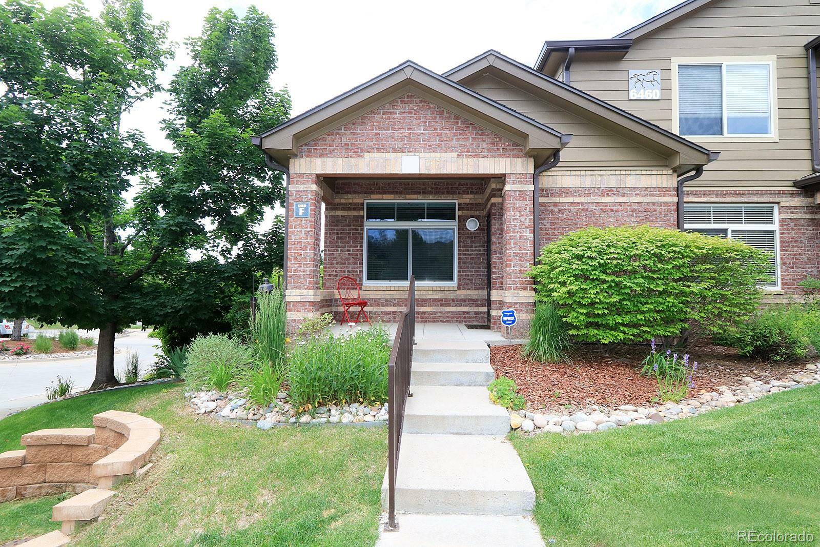 Property Photo:  6460 Silver Mesa Drive F  CO 80130 