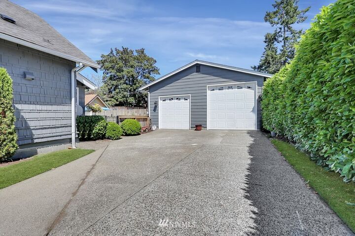 Property Photo: 6031 S Puget Sound Avenue WA 98409