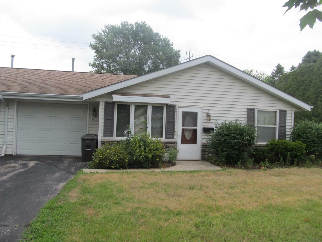 Property Photo:  701 East Clay St G1  WI 53190 