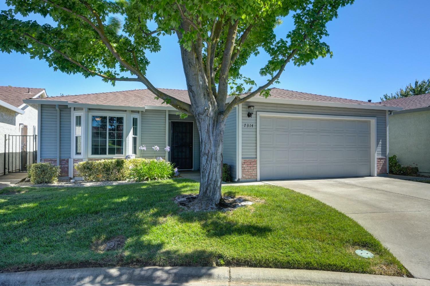 Property Photo:  7314 Sunleaf Lane  CA 95828 