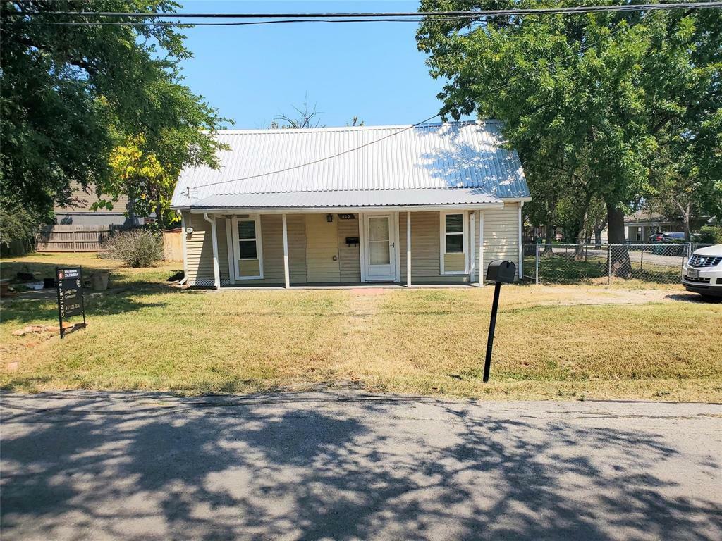 Property Photo:  409 E 7th Street  TX 75125 