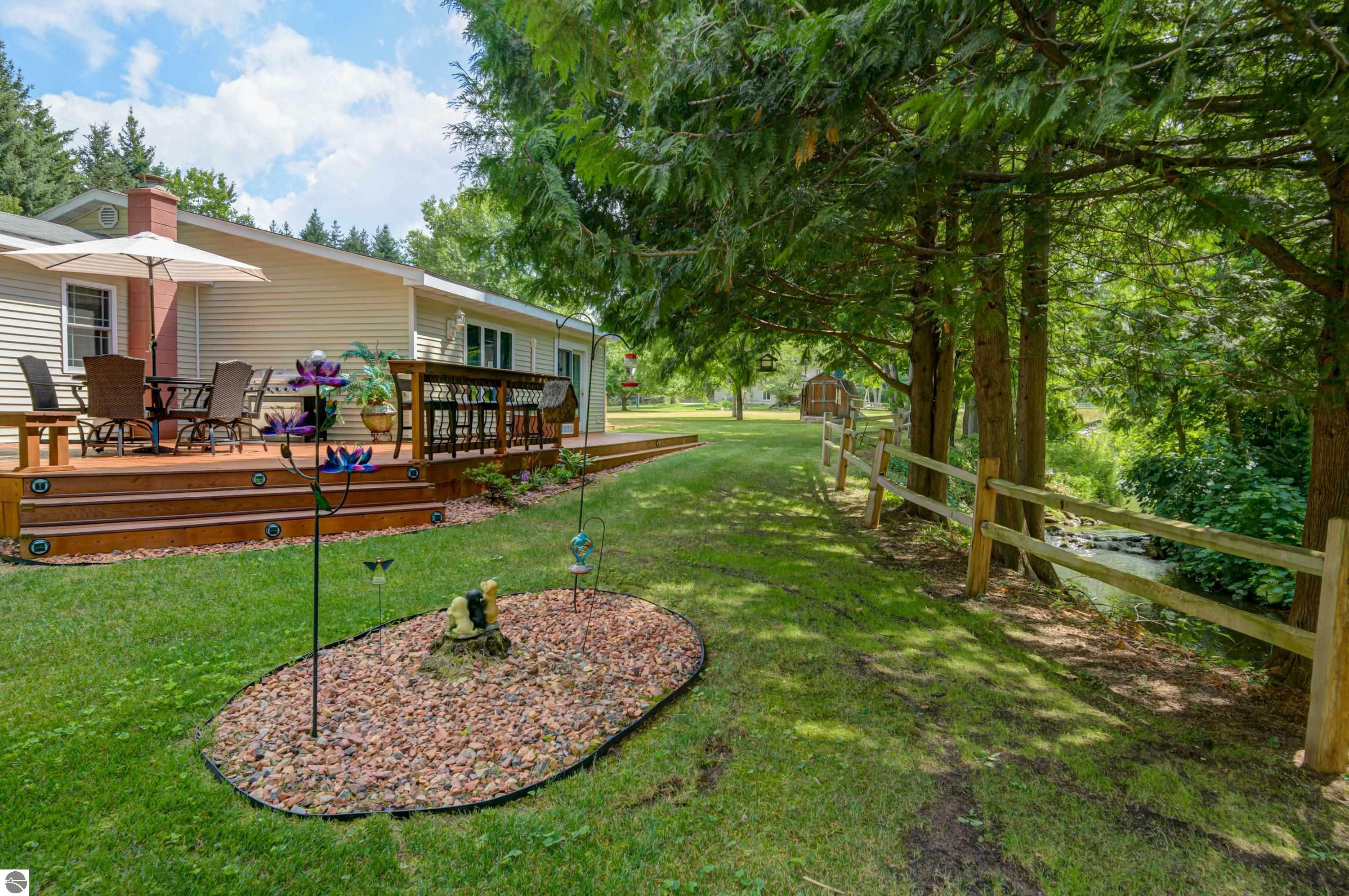 Property Photo:  3818 E Duck Lake Road  MI 49637-9654 