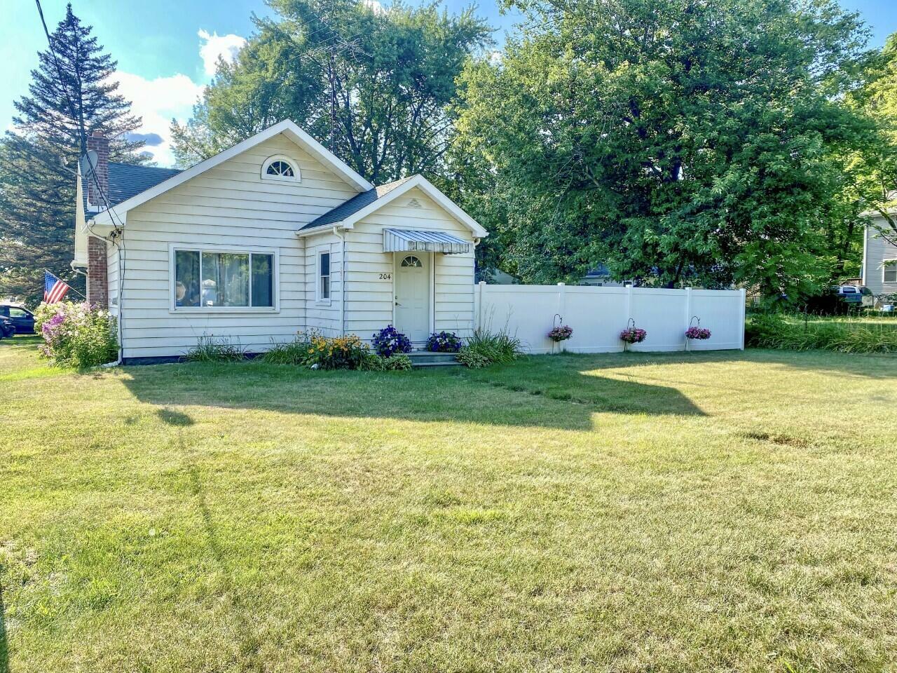 Property Photo:  204 Holmes Street  MI 49254 