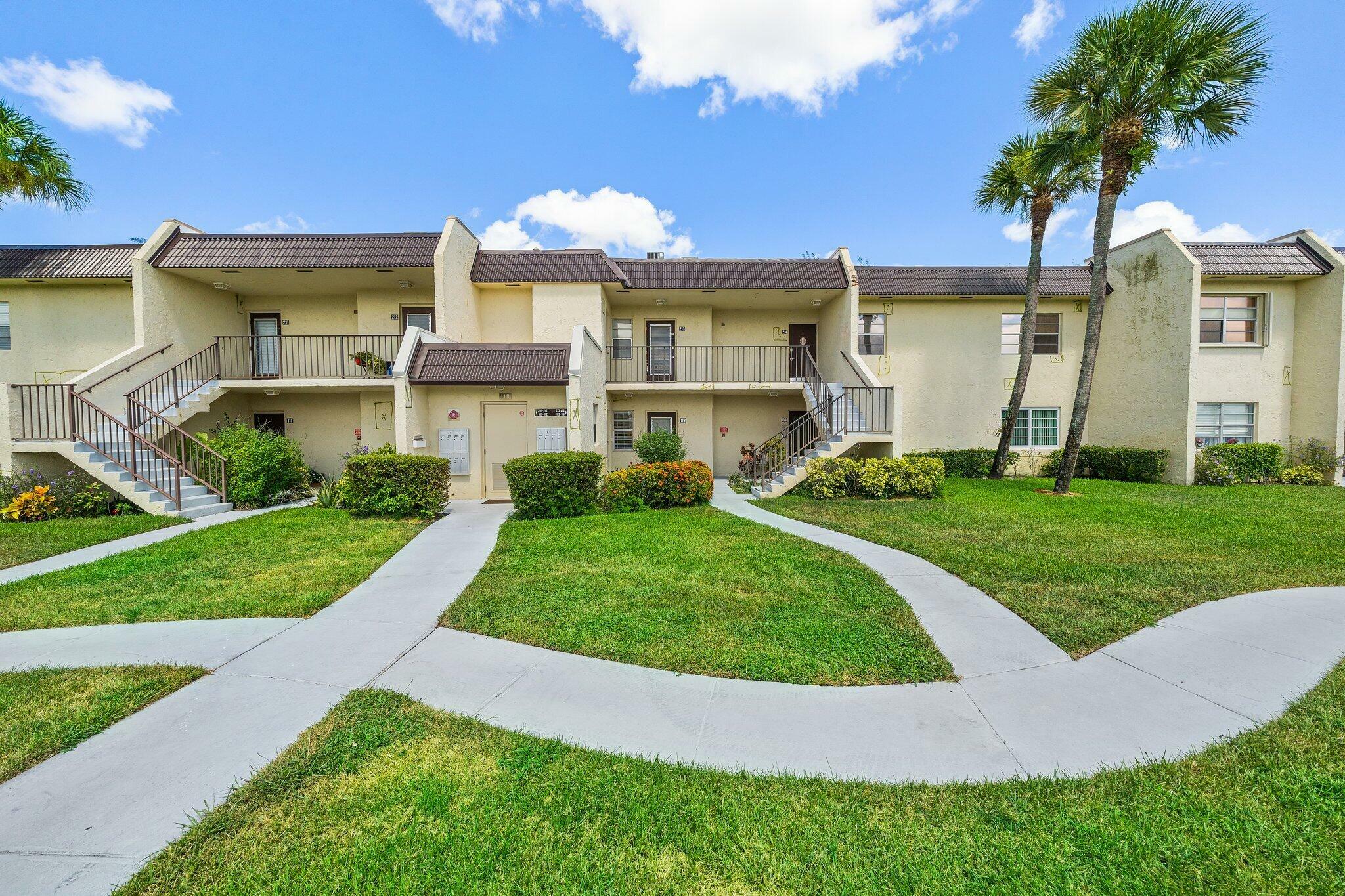 Property Photo: 110 Lake Meryl Drive 113 FL 33411