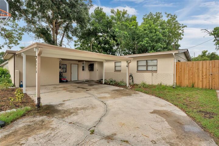 Property Photo:  3713 Wade Rd Road  FL 32808 