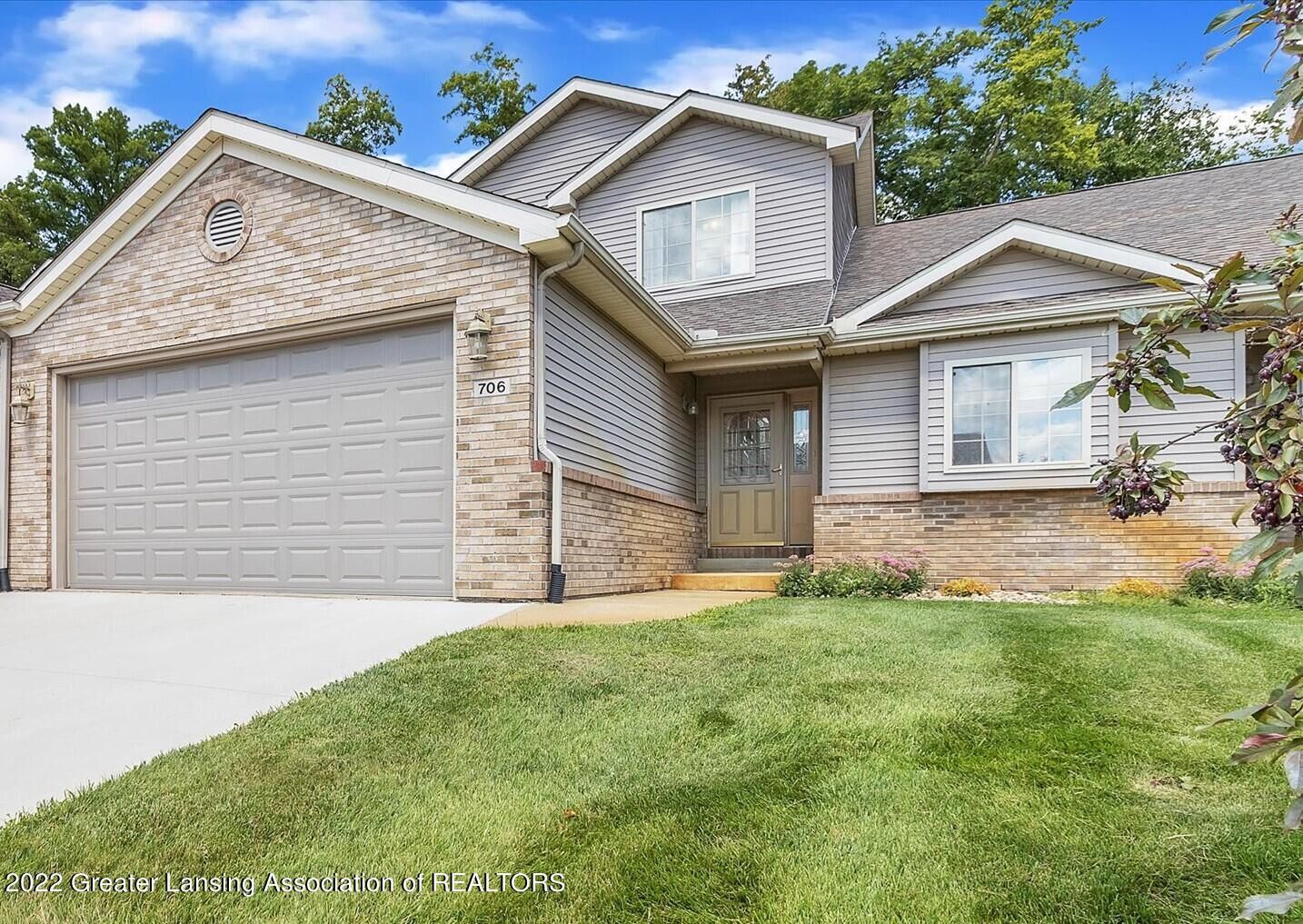 Property Photo:  706 Treetop Trail  MI 48813 