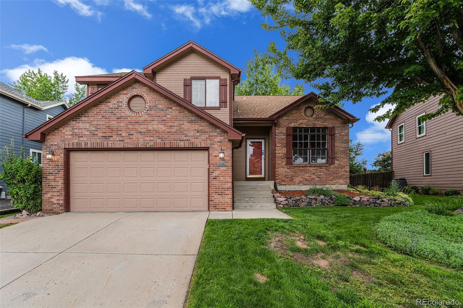 Property Photo: 6939 Howell Street CO 80004