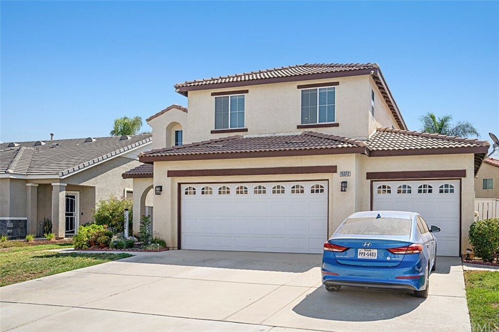 Property Photo:  15372 Avenida Anillo  CA 92555 
