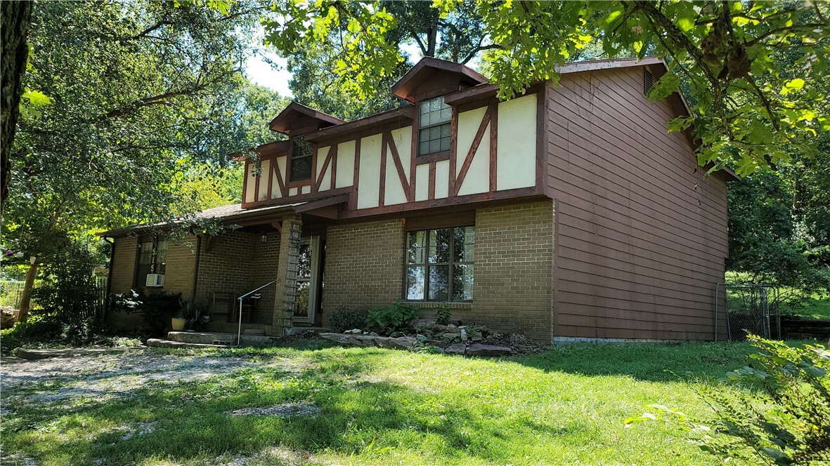 Property Photo:  515 N Cato Springs Road  AR 72701 