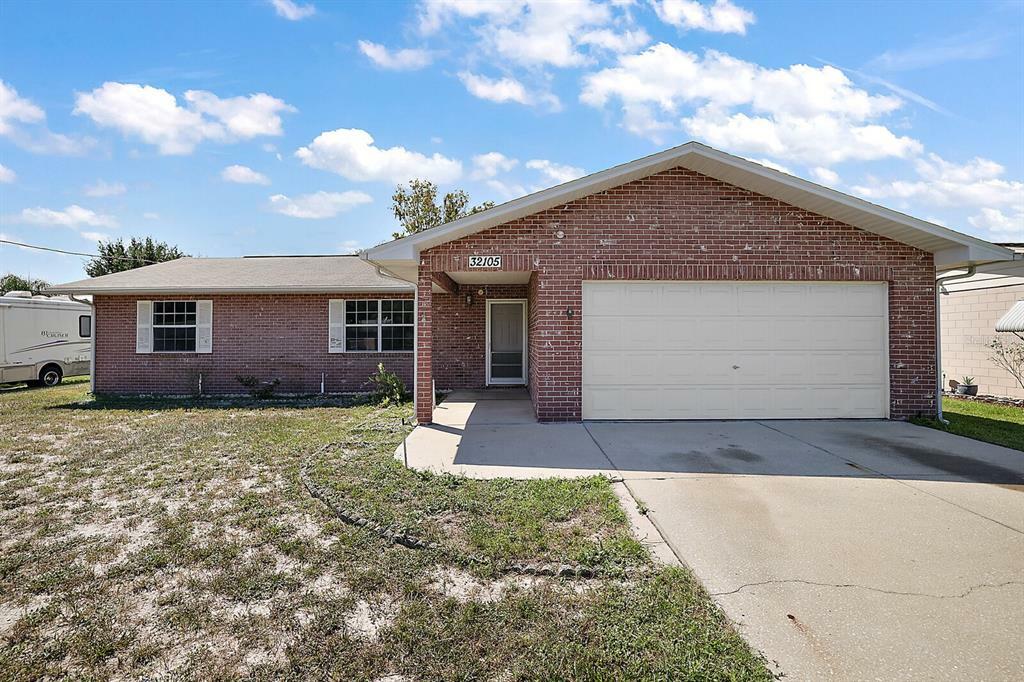 Property Photo:  32105 Perch Avenue  FL 32778 