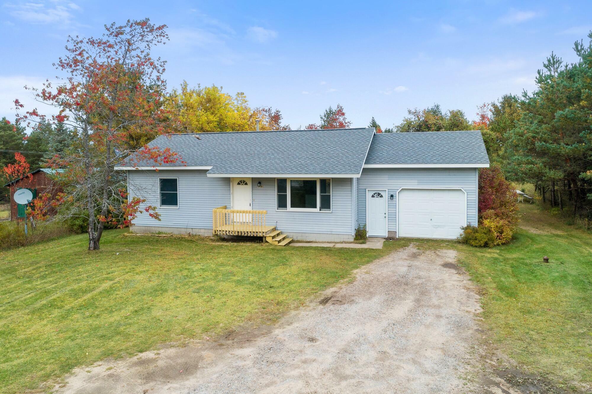 Property Photo:  9095 Old 27 N Highway  MI 49795 