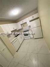 Property Photo:  10754 Royal Palm Blvd 8-4  FL 33065 