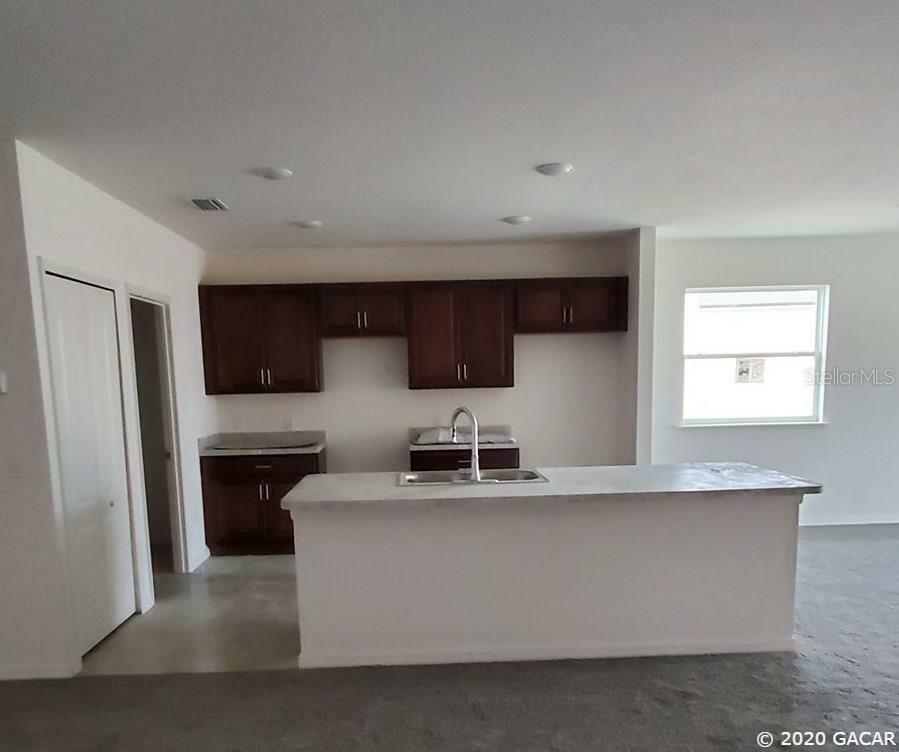 Property Photo:  889 NW 252nd Drive  FL 32669 