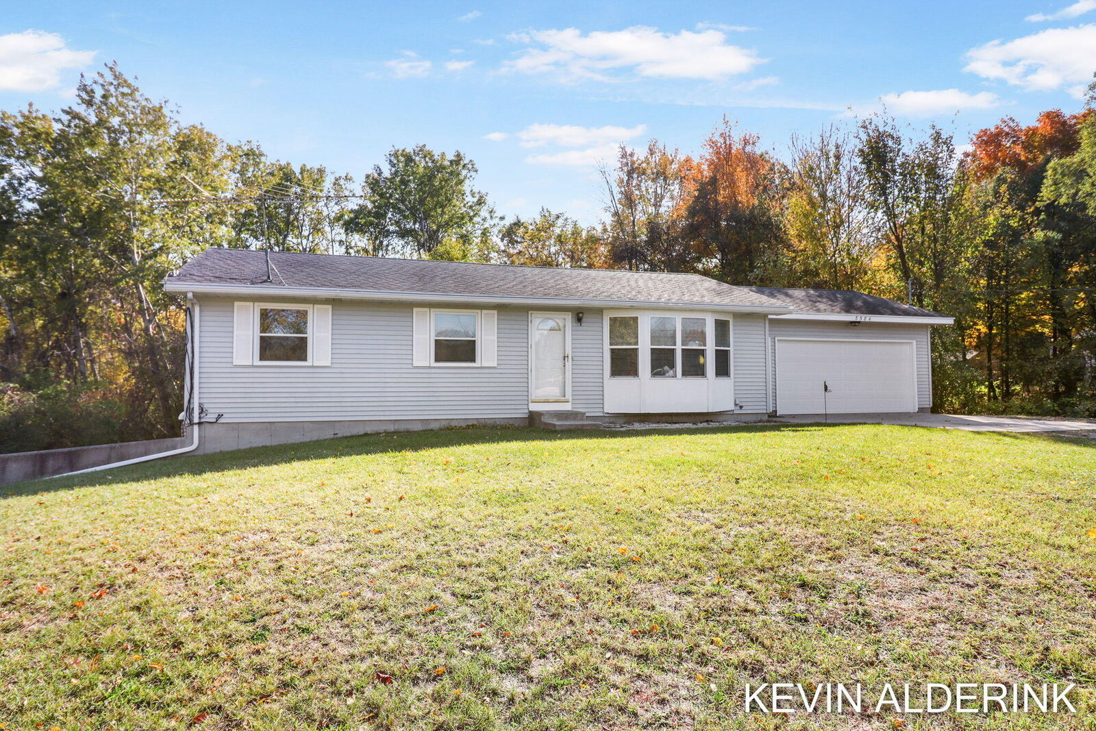 Property Photo:  5584 126th Avenue  MI 49408 