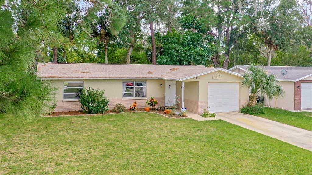 Property Photo: 5716 Berlin Drive FL 34668