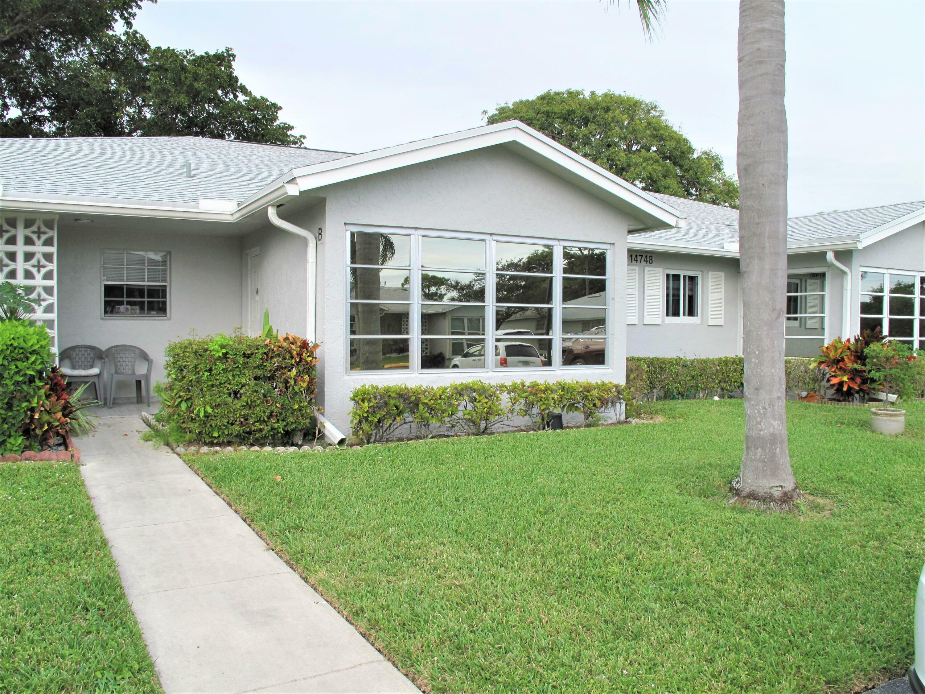 Property Photo:  14748 Canalview Drive B  FL 33484 