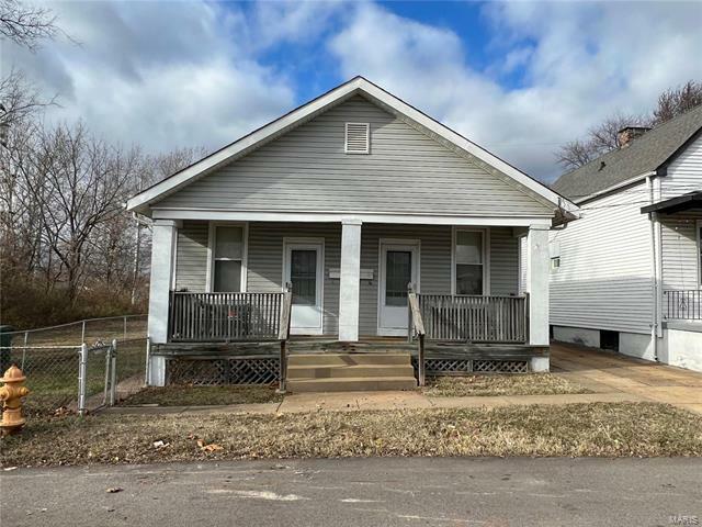 Property Photo:  8441 Tennessee Avenue  MO 63125 