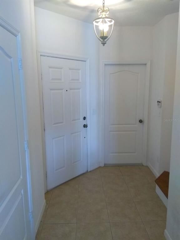 Property Photo:  10735 Savannah Wood Drive 208  FL 32832 