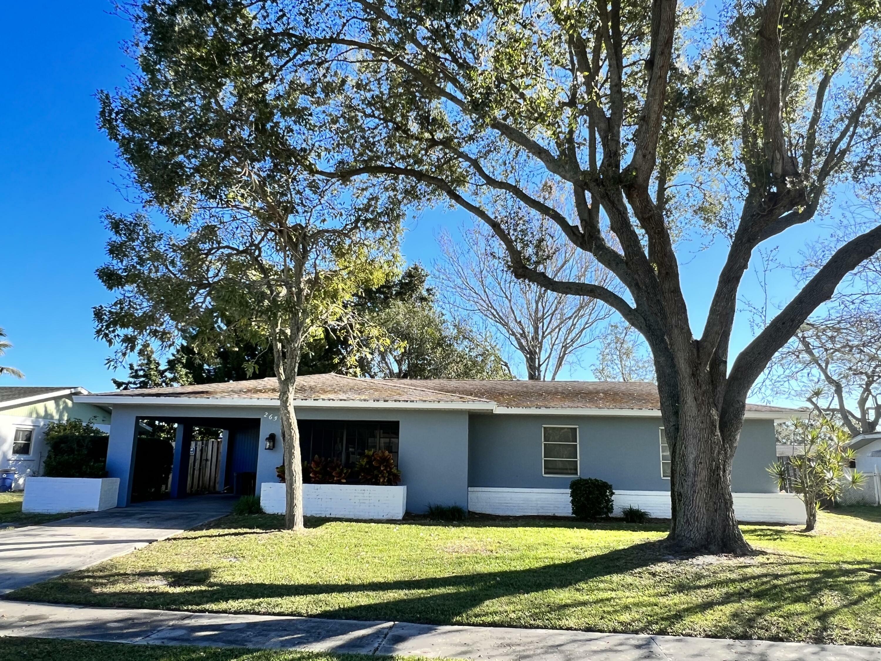 Property Photo:  265 NE Mainsail Street  FL 34983 