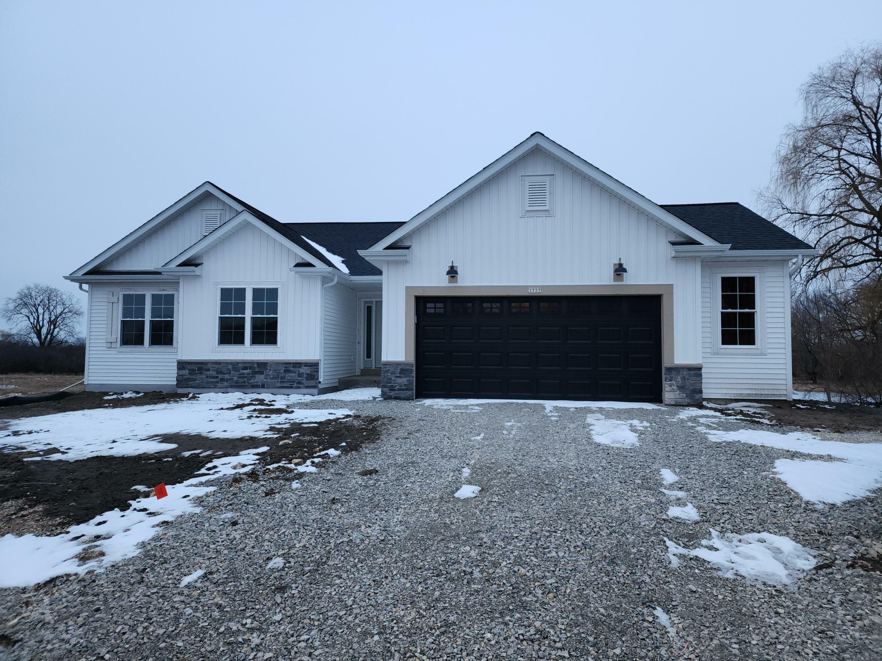 Property Photo: 1737 Arthurs Pass WI 53066