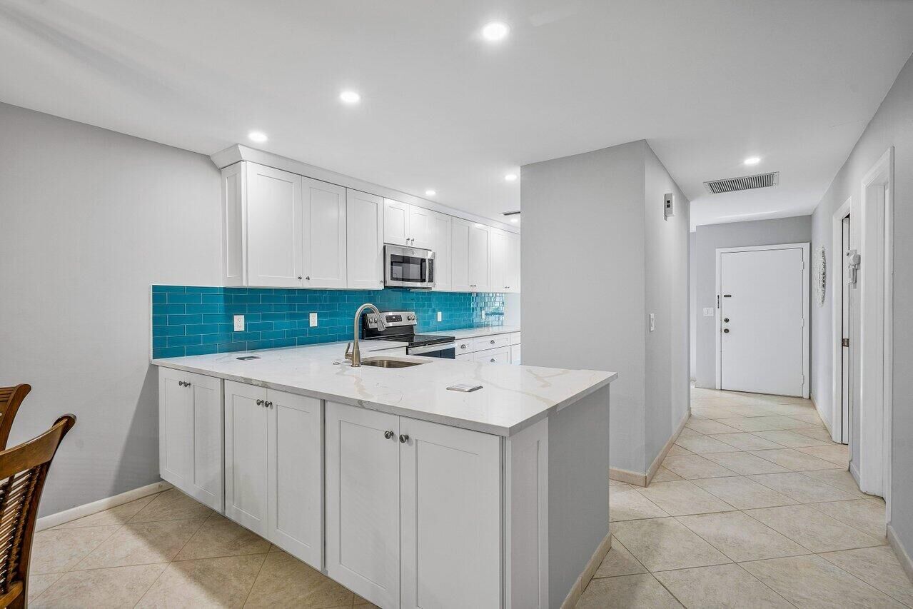 Property Photo: 13632 Coconut Palm Court A FL 33484