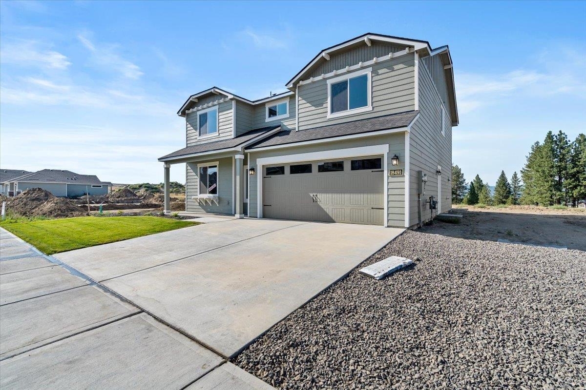 Property Photo: 18491 E 17th Ave 8/4 Timberline WA 99016