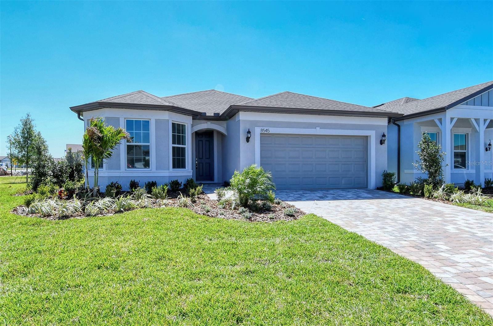 Property Photo:  8545 Coastal Palms Glen  FL 34219 