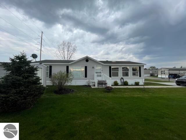 Property Photo:  3211 Pipes Circle  MI 48801 