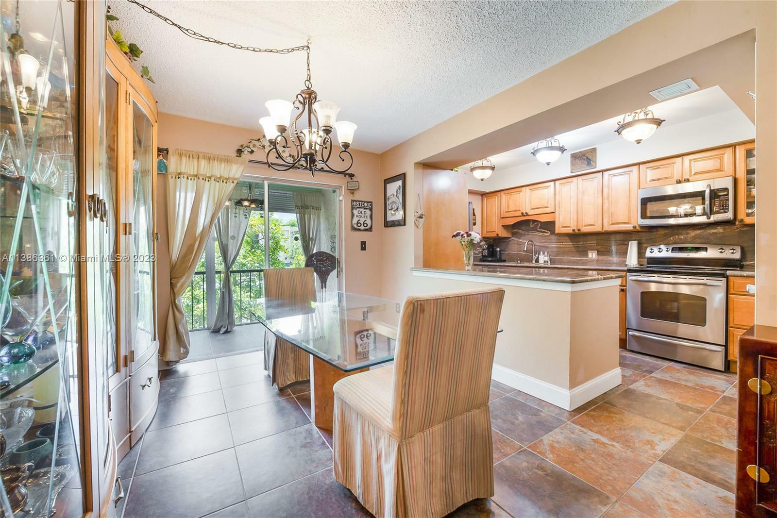 Property Photo:  8401 SW 107th Ave 214E  FL 33173 