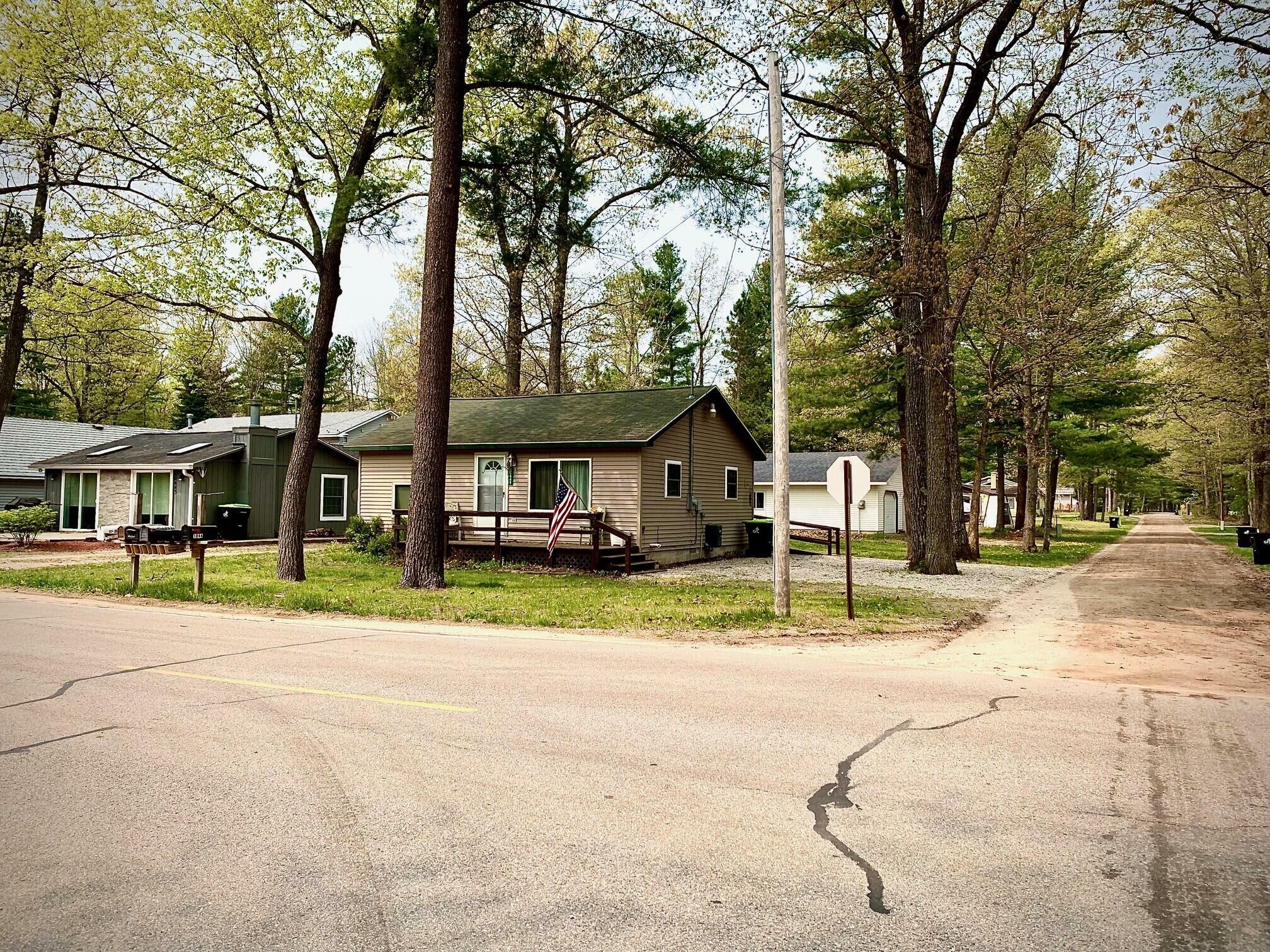 Property Photo:  10449 W Higgins Lake Drive  MI 48653 