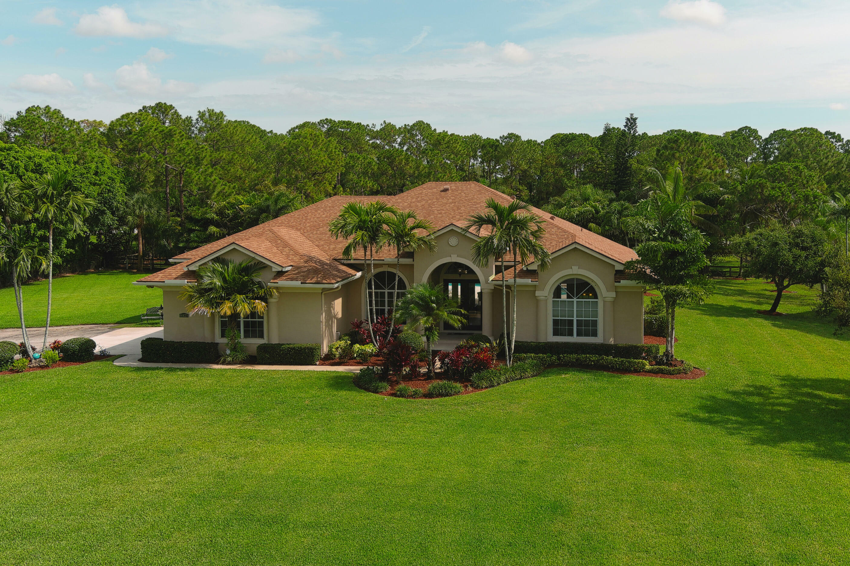 Property Photo: 14423 Temple Boulevard FL 33470