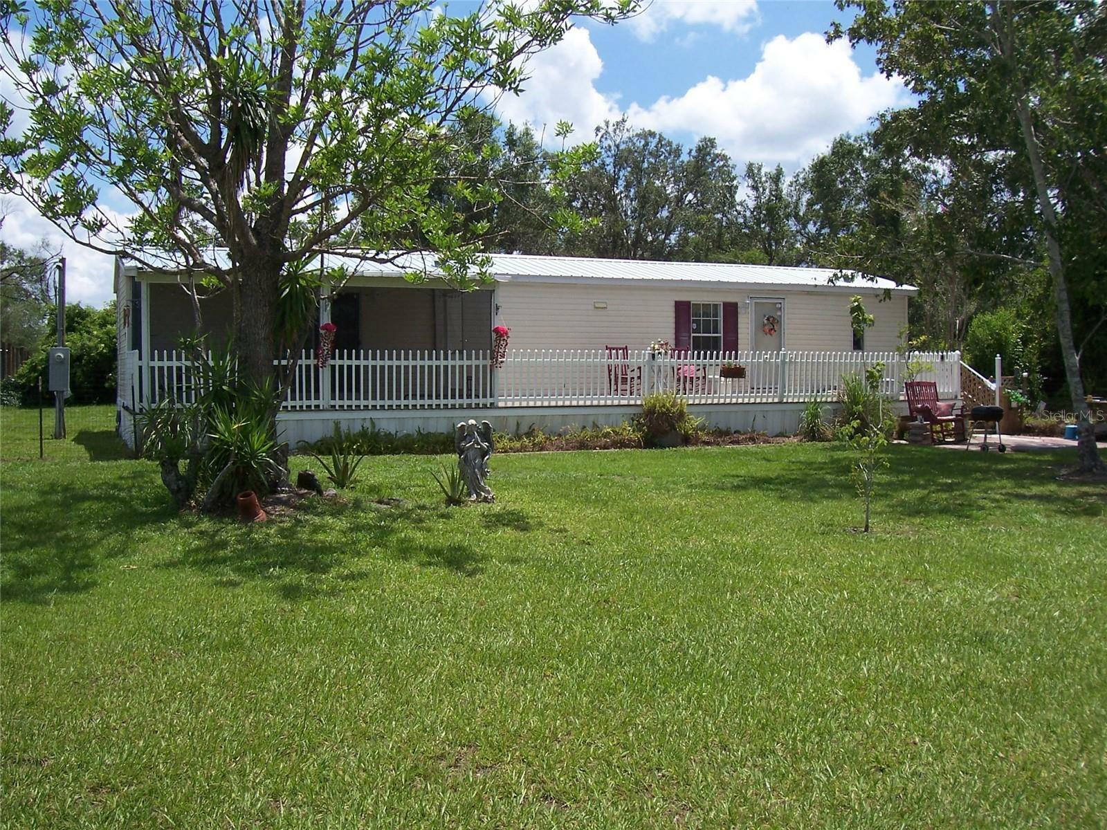 Property Photo:  3905 NW Green Tree Street  FL 34266 