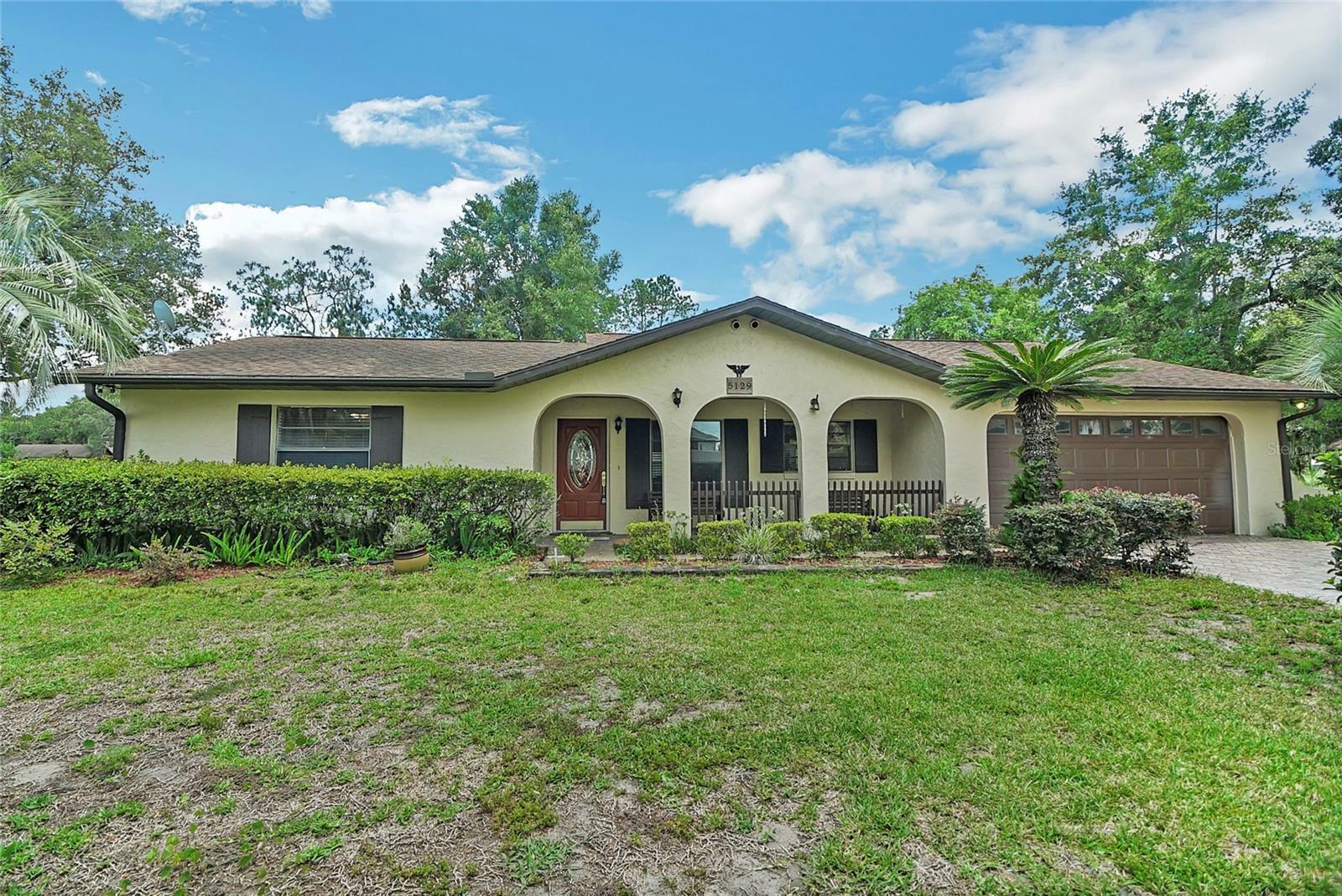 Property Photo:  5129 County Road 114  FL 34785 