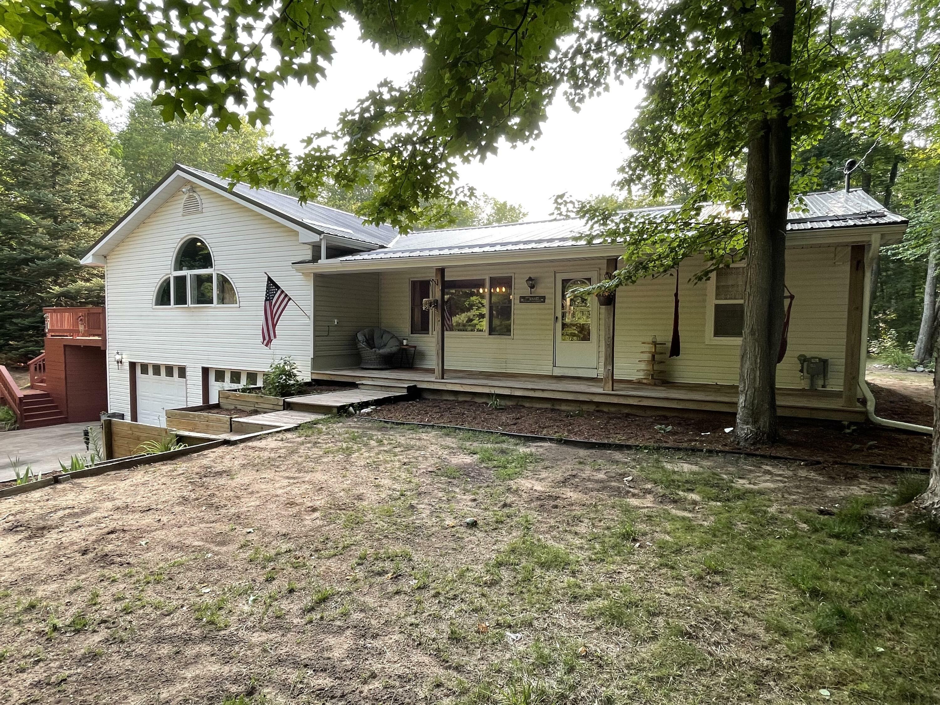 Property Photo:  5702 Pueblo Trail  MI 49735 