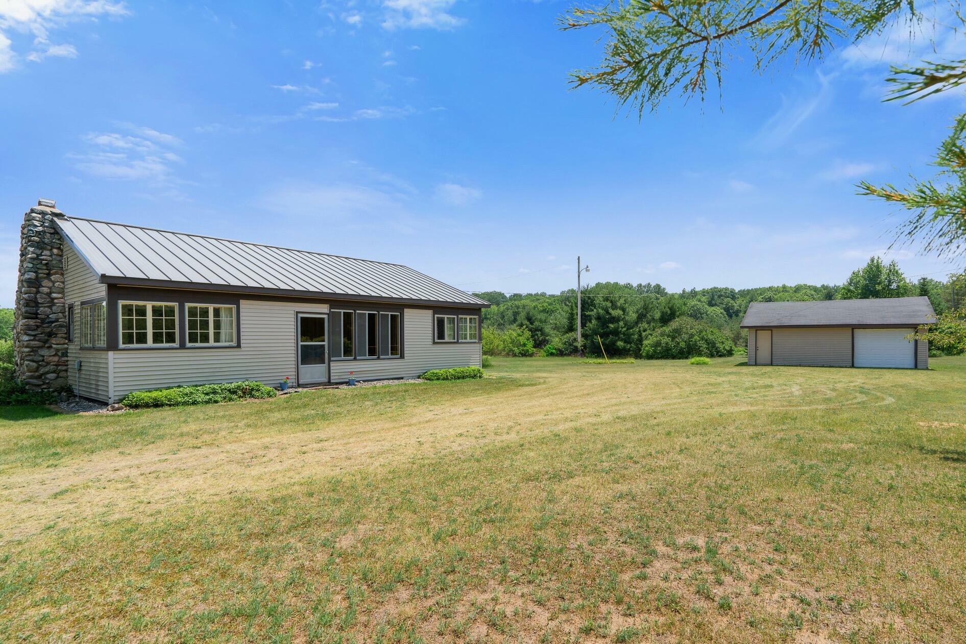 Property Photo:  3990 S Extension Road  MI 49721 