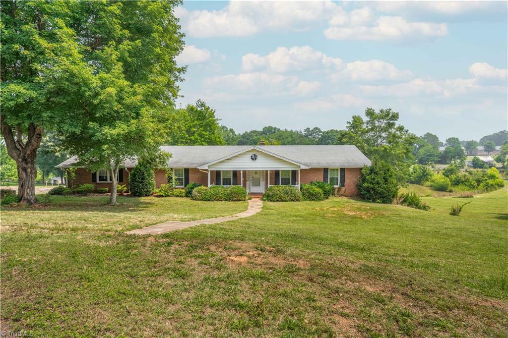 Property Photo:  2900 Wonderwood Drive  NC 27103 