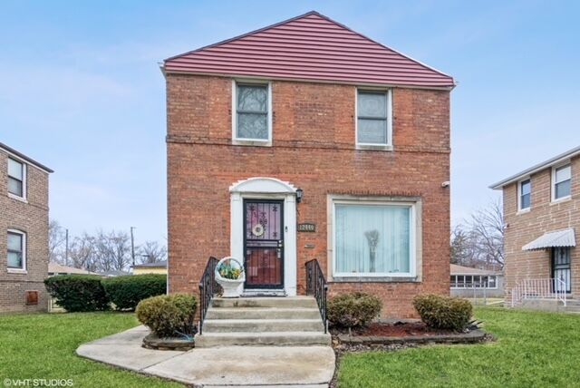 Property Photo:  12440 S Carpenter Street  IL 60827 