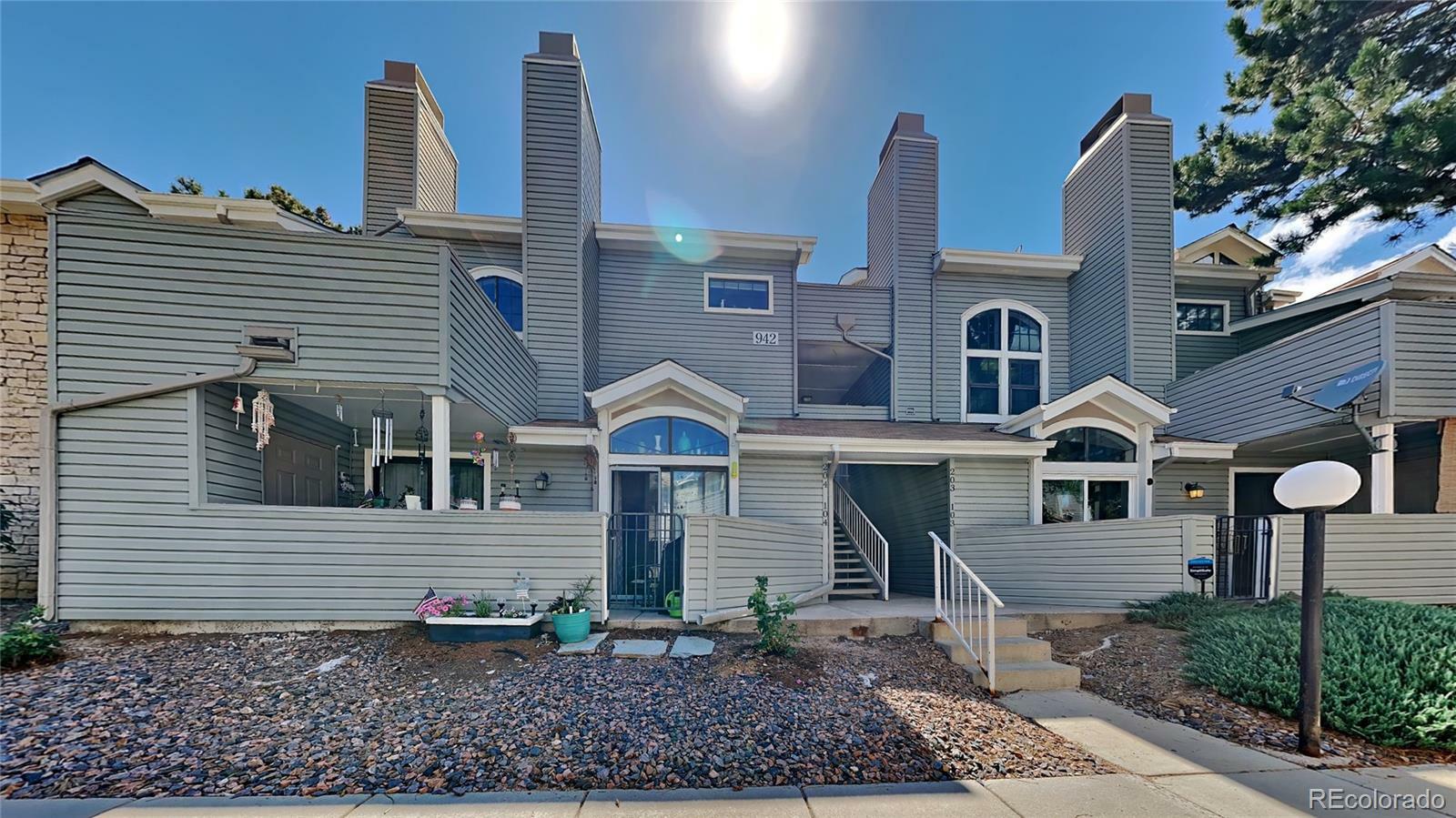 Property Photo: 942 S Walden Street 103 CO 80017