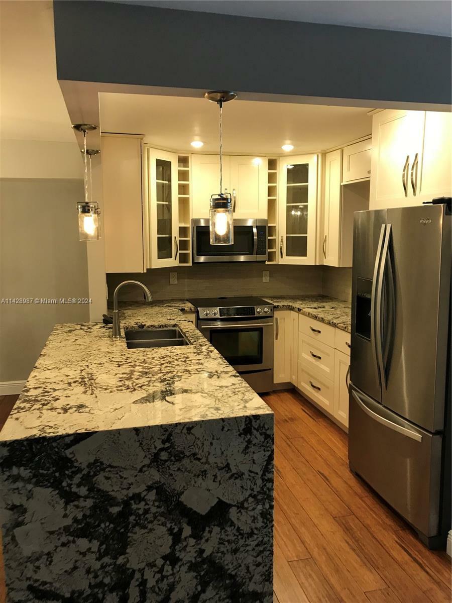 Property Photo:  395 N Laurel Dr 304  FL 33063 