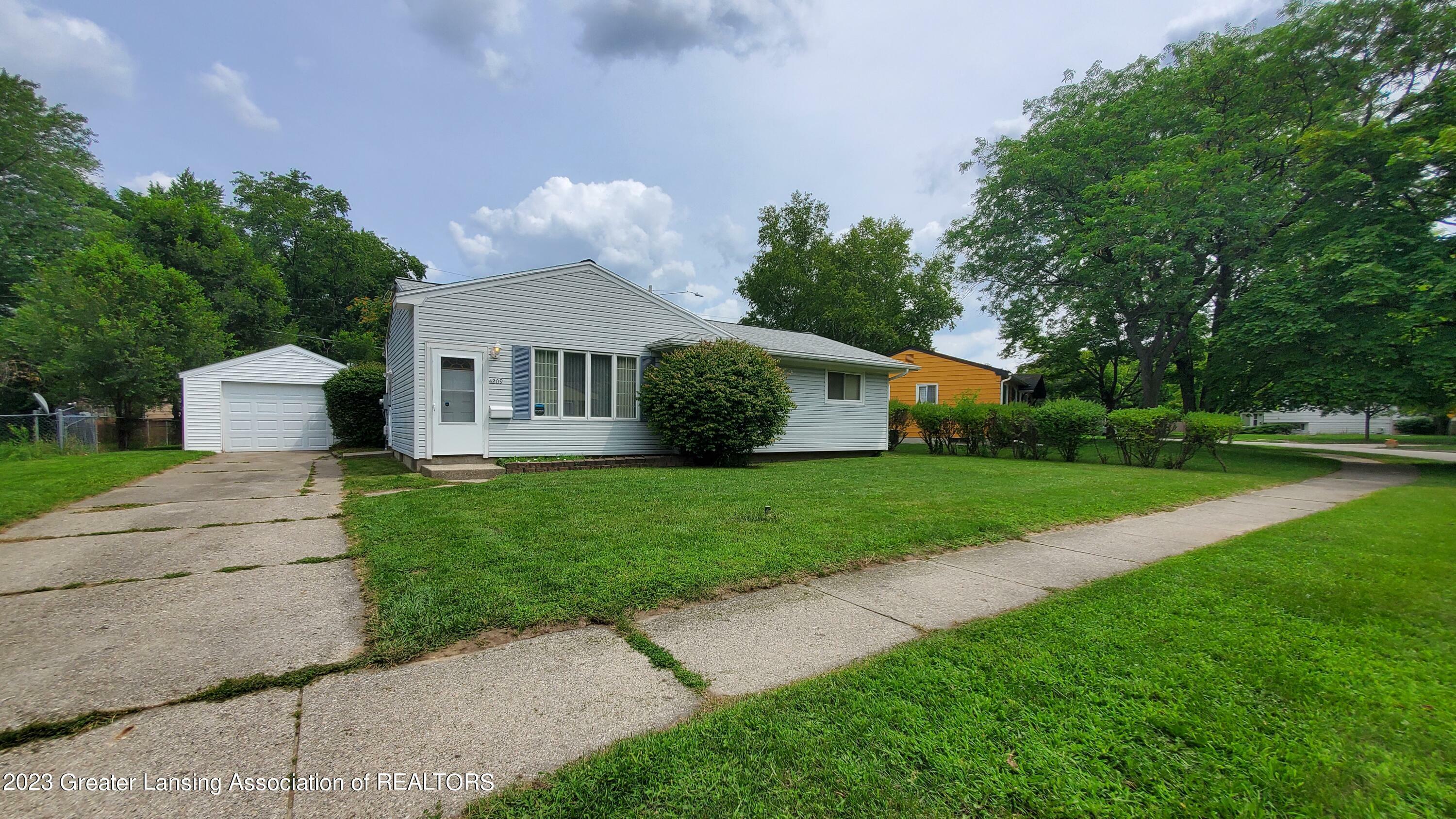 Property Photo:  4209 Brighton Drive  MI 48911 