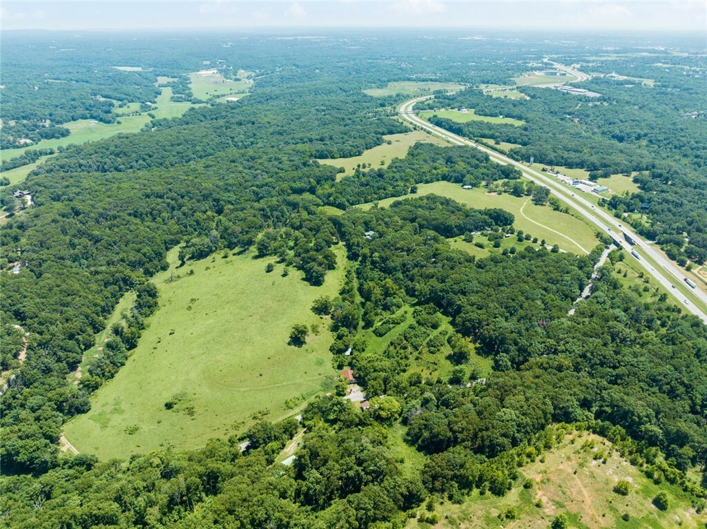 Property Photo:  55.59 Acres Slaughter Pen Road  AR 72712 