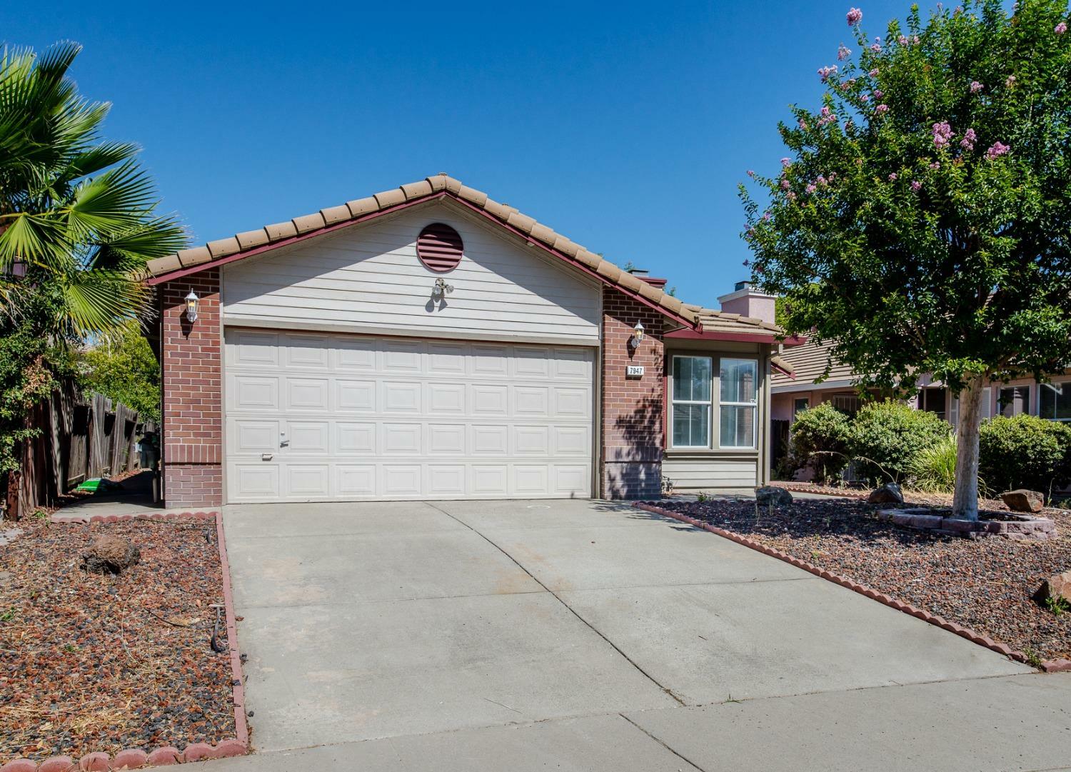 Property Photo:  7947 Katella Way  CA 95621 