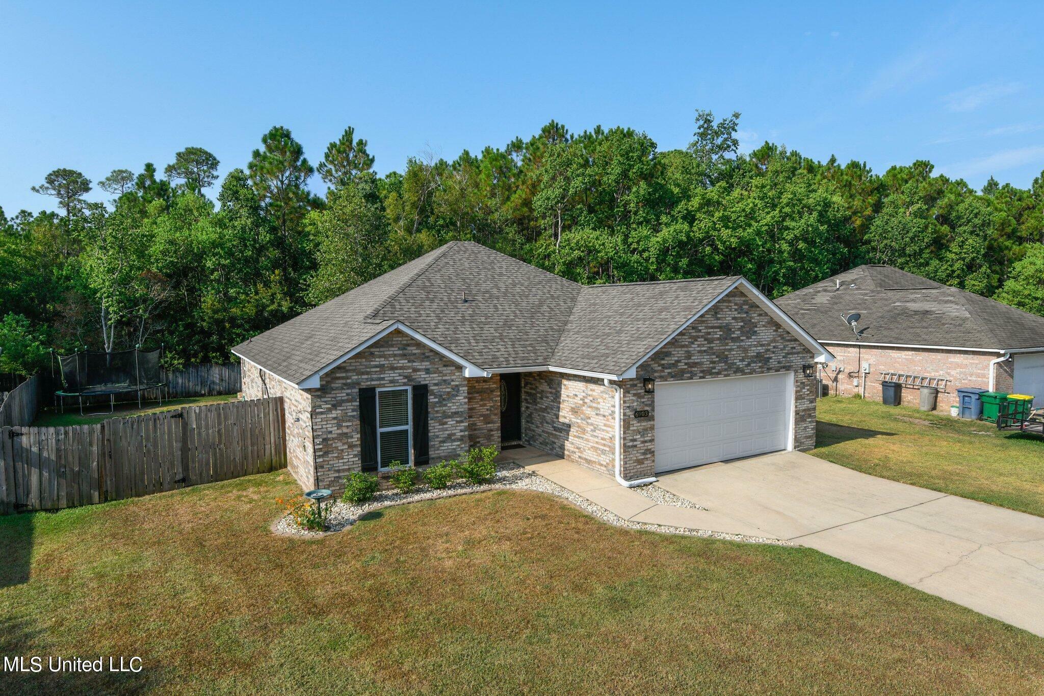 Property Photo:  6903 Pinehurst Drive  MS 39564 