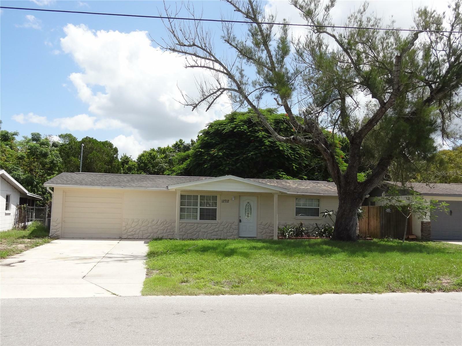Property Photo: 12712 College Hill Drive FL 34667