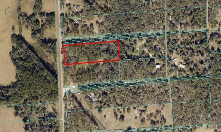 Property Photo:  12851 NW Highway 225  FL 32686 