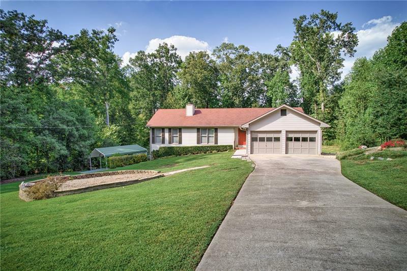 Property Photo:  430 Oakleaf Trail  GA 30024 