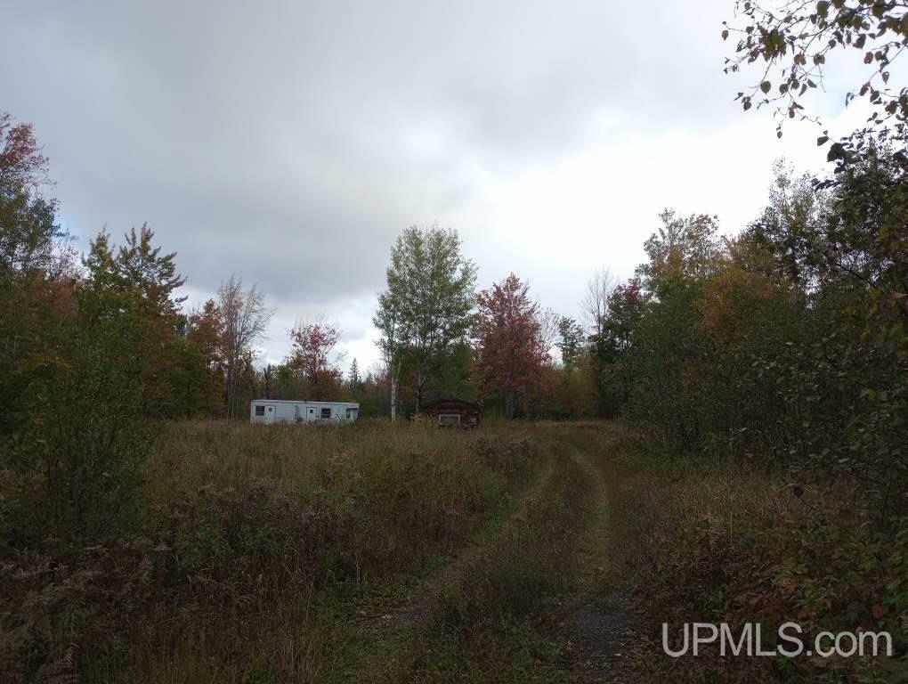 Property Photo:  28458 Sandstone  MI 49945 