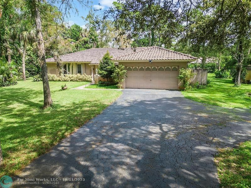 Property Photo:  4780 Godfrey Rd  FL 33067 