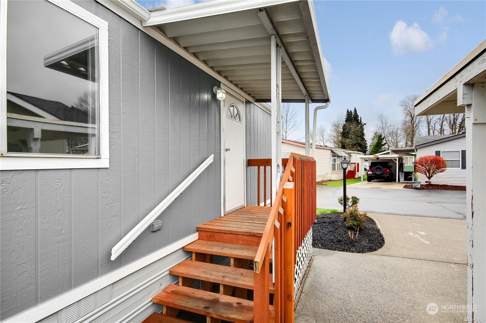 Property Photo:  10717 63rd Street E 26  WA 98372 